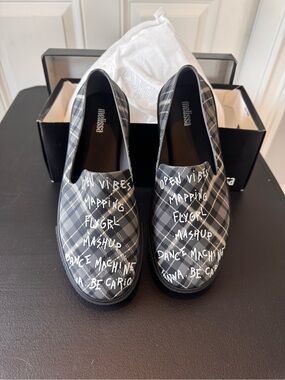 Melissa Ground Gray Black tartan print. Size 8 US 
Slip-On Flats NIB